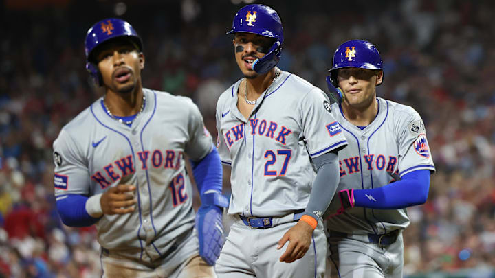 Sep 13, 2024; Philadelphia, Pennsylvania, USA; New York Mets outfielder Brandon Nimmo (9) celebrates with third base Mark Vientos (27) and shortstop Francisco Lindor (12) after hitting a three run home run during the fifth inning against the Philadelphia Phillies at Citizens Bank Park. Mandatory Credit: Bill Streicher-Imagn Images