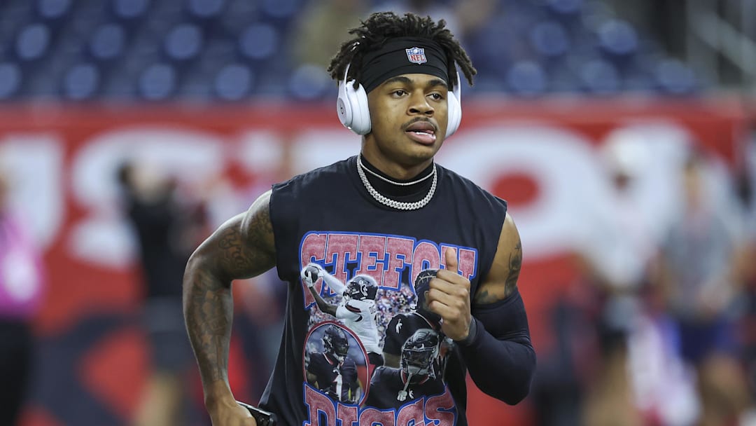 Nov 10, 2024; Houston, Texas, USA; Houston Texans wide receiver Tank Dell (3) wears a shirt with wide receiver Stefon Diggs (1) before the game against the Detroit Lions at NRG Stadium.
