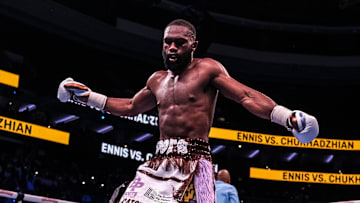 Jaron Ennis Celebrates after knocking Karen Chukhadzhian down in the 5th round.