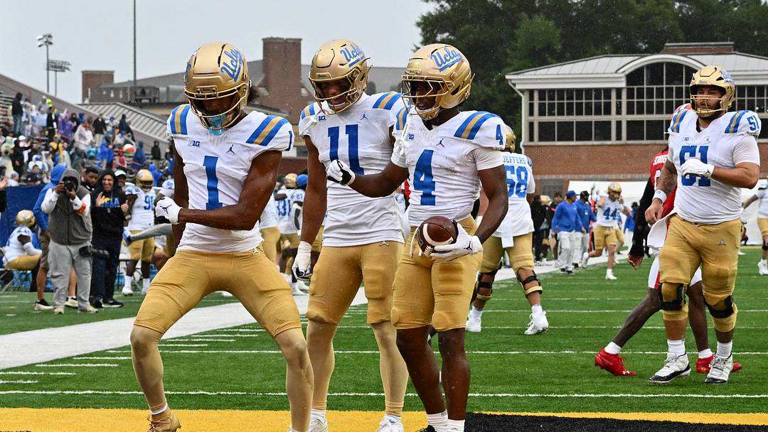 Sep 26, 2026; College Park, Maryland, USA;  UCLA Bruins wide receiver Aidan Mizell (1) dances in the end zone with wide receiver Landon Ellis (11) and wide receiver Semaj Morgan (4) after catching an 83-yard touchdown reception in the second half against the Maryland Terrapins at SECU Stadium. Mandatory Credit: Jamie Sabau-Imagn Images