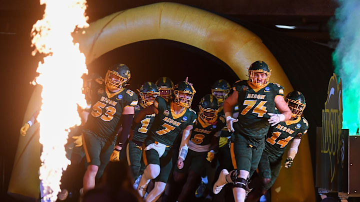 North Dakota State Bison football runs out to the field for their semi-final game against the South Dakota State Jackrabbits on Saturday, Dec. 21, 2024, at Fargodome in Fargo, Nouth Dakota.
