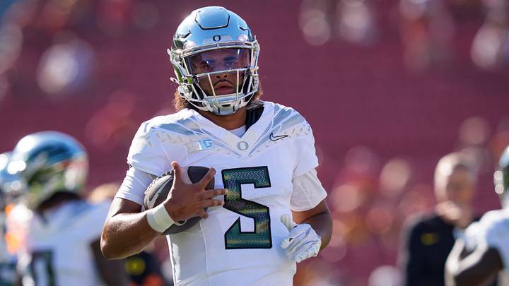Oregon quarterback Dante Moore warms up as the Oregon Ducks face the USC Trojans on Sept. 26, 2026, at Los Angeles Memorial Coliseum in Los Angeles, California.