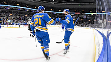 Oct 2, 2025; St. Louis, Missouri, USA; St. Louis Blues defenseman Philip Broberg (6) is congratulated by right wing Jimmy Snuggerud (21) after scoring against the Ottawa Senators during the second period at Enterprise Center. Mandatory Credit: Jeff Curry-Imagn Images
