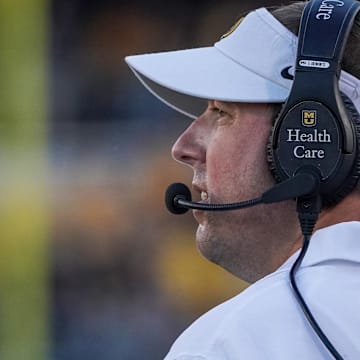 Aug 31, 2023; Columbia, Missouri, USA; Missouri Tigers head coach Eli Drinkwitz watches play against the South Dakota Coyotes during the first half at Faurot Field at Memorial Stadium. Mandatory Credit: Denny Medley-Imagn Images