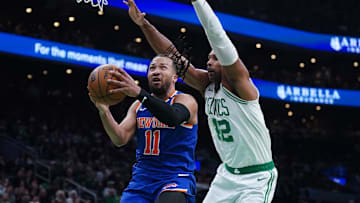 May 5, 2025; Boston, Massachusetts, USA; New York Knicks guard Jalen Brunson (11) drives the ball to the basket against Boston Celtics center Al Horford (42) in the second quarter during game one of the second round for the 2025 NBA Playoffs at TD Garden. Mandatory Credit: David Butler II-Imagn Images