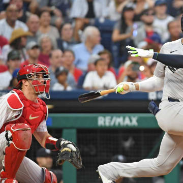 Jul 29, 2024; Philadelphia, Pennsylvania, USA;  New York Yankees outfielder Juan Soto (22) hits a two RBI double against the Philadelphia Phillies during the fifth inning at Citizens Bank Park.
