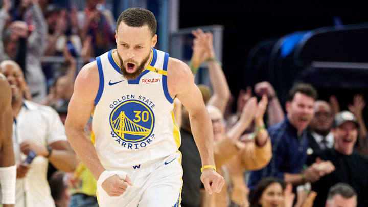 Apr 13, 2025; San Francisco, California, USA; Golden State Warriors guard Stephen Curry (30) reacts after making a three-point basket against LA Clippers guard Kris Dunn (8) during the fourth quarter at Chase Center. Mandatory Credit: Robert Edwards-Imagn Images