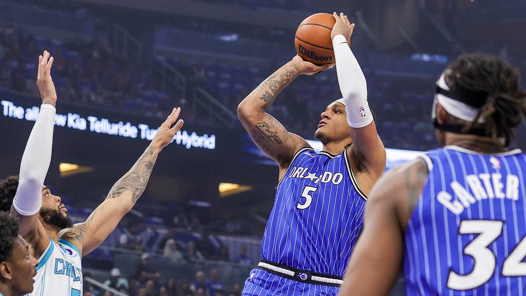 Apr 17, 2026; Orlando, Florida, USA; Orlando Magic forward Paolo Banchero (5) shoots against Charlotte Hornets forward Miles Bridges (0) during the first quarter during the play-in rounds of the 2026 NBA Playoffs at Kia Center. Mandatory Credit: Mike Watters-Imagn Images Apr 17, 2026; Orlando, Florida, USA; Orlando Magic forward Paolo Banchero (5) shoots against Charlotte Hornets forward Miles Bridges (0) during the first quarter during the play-in rounds of the 2026 NBA Playoffs at Kia Center. Mandatory Credit: Mike Watters-Imagn Images