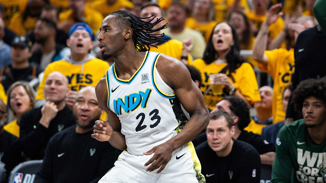Apr 29, 2025; Indianapolis, Indiana, USA; Indiana Pacers forward Aaron Nesmith (23) celebrates a made basket lduring game five of the first round for the 2024 NBA Playoffs against the Milwaukee Bucks at Gainbridge Fieldhouse. Mandatory Credit: Trevor Ruszkowski-Imagn Images