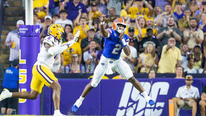 Sep 13, 2025; Baton Rouge, Louisiana, USA;  Florida Gators quarterback DJ Lagway (2) passes against LSU Tigers defensive end Patrick Payton (6) during the first half at Tiger Stadium. Mandatory Credit: Stephen Lew-Imagn Images