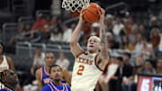 Nov 8, 2024; Austin, Texas, USA; Texas Longhorns guard Chendall Weaver (2) lays in a basket during the second half against the Houston Christian Huskies at Moody Center. Mandatory Credit: Scott Wachter-Imagn Images