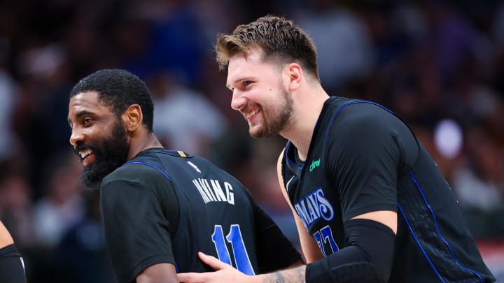 Feb 22, 2024; Dallas, Texas, USA; Dallas Mavericks guard Luka Doncic (77) celebrates with Dallas Mavericks guard Kyrie Irving (11)  during the second half against the Phoenix Suns at American Airlines Center. Mandatory Credit: Kevin Jairaj-USA TODAY Sports