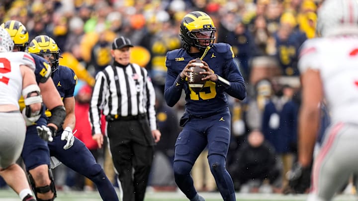 Michigan quarterback Bryce Underwood (19) looks to pass against Ohio State during the first half at Michigan Stadium in Ann Arbor on Saturday, Nov. 29, 2025.