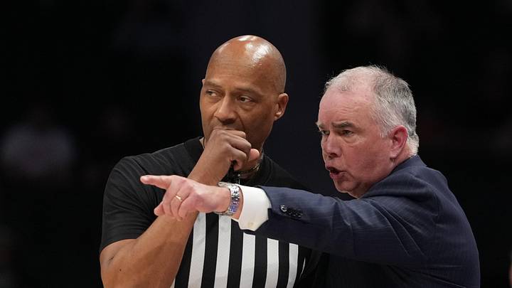 Mar 10, 2026; Charlotte, NC, USA; Virginia Tech Hokies head coach Mike Young talks to the official in the first half at Spectrum Center. Mandatory Credit: Bob Donnan-Imagn Images