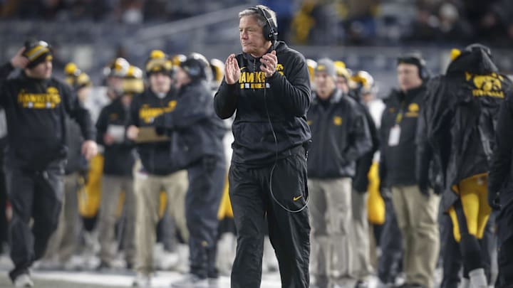 Iowa head coach Kirk Ferentz cheers after the Hawkeyes scored a touchdown against Boston College on Wednesday, Dec. 27, 2017.