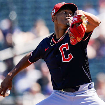 Cleveland Guardians Triston McKenzie (24) throws a pitch in the first inning of a Cactus League game between the Cincinnati Reds and Cleveland Guardians, Saturday, Feb. 22, 2025, at the Goodyear Ballpark in Goodyear, Ariz.