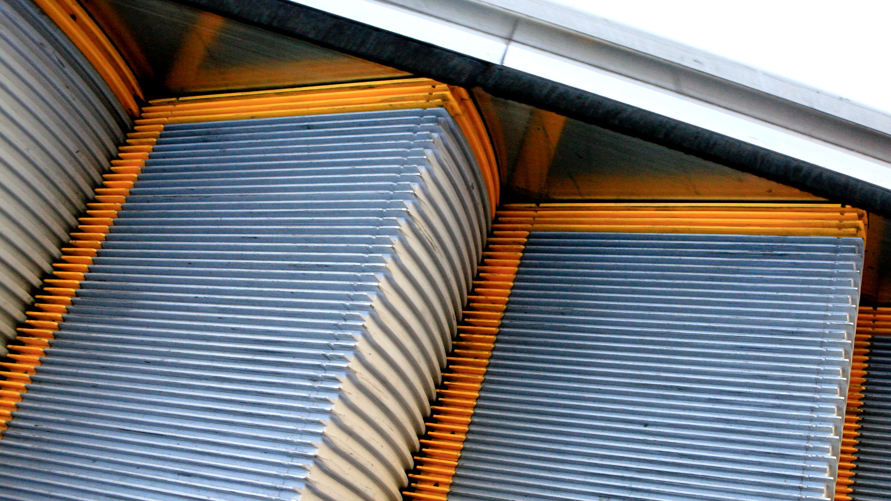 Why Do Escalators Have Brushes on the Sides?