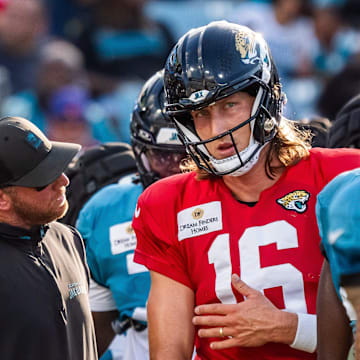 Jacksonville Jaguars head coach Liam Coen talks with Jacksonville Jaguars quarterback Trevor Lawrence (16) between plays before an NFL scrimmage at EverBank Stadium Friday August 1, 2025, in Jacksonville, Fla. [Doug Engle/Florida Times-Union]