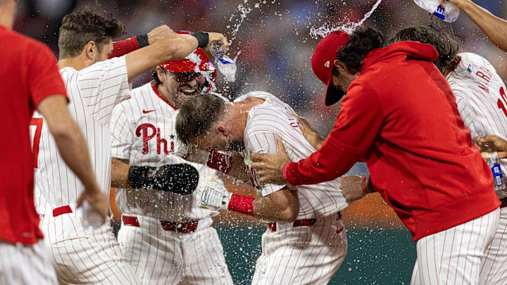 Sep 9, 2024; Philadelphia, Pennsylvania, USA; Philadelphia Phillies first base Kody Clemens is mobbed by his team.