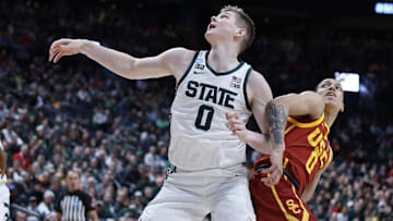 Mar 17, 2023; Columbus, OH, USA; Michigan State Spartans forward Jaxon Kohler (0) battles USC