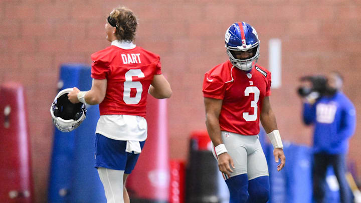 Jun 17, 2025; East Rutherford, NJ, USA; New York Giants quarterback Jaxson Dart (6) and quarterback Russell Wilson (3) interact during minicamp at Quest Diagnostics Training Center. Mandatory Credit: John Jones-Imagn Images