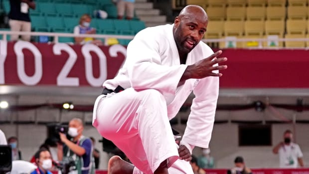 Teddy Riner (FRA) celebrates beating Hisayoshi Harasawa (JPN) in the men's judo +100kg bronze medal match.