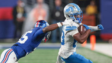 Aug 8, 2024; East Rutherford, New Jersey, USA; Detroit Lions wide receiver Isaiah Williams (83) gains yards after catch as New York Giants running back Jashaun Corbin (35) pursues during the second half at MetLife Stadium. Mandatory Credit: Vincent Carchietta-USA TODAY Sports