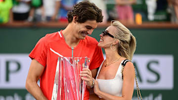 Taylor Fritz (USA) with his girlfriend Morgan Riddle after defeating Rafael Nadal (ESP) in the mens final at the BNP Paribas Open at the Indian Wells Tennis Garden. 
