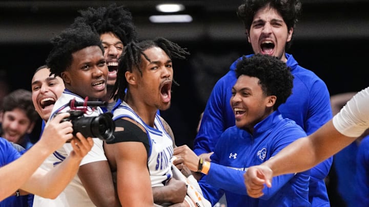 Seton Hall Pirates guard Dre Davis (14) yells in excitement Thursday, April 4, 2024, after winning the NIT championship game at Hinkle Fieldhouse in Indianapolis. The Seton Hall Pirates defeated the Indiana State Sycamores, 79-77.