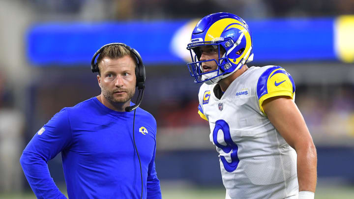 Sep 12, 2021; Inglewood, California, USA; Los Angeles Rams head coach Sean McVay talks with quarterback Matthew Stafford (9) during a time out in the fourth quarter of the game against the Chicago Bears at SoFi Stadium. Mandatory Credit: Jayne Kamin-Oncea-USA TODAY Sports