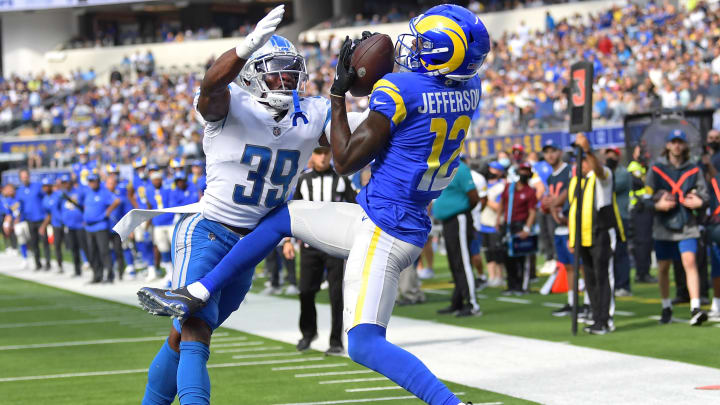 Oct 24, 2021; Inglewood, California, USA; Los Angeles Rams wide receiver Van Jefferson (12) gets in front of Detroit Lions cornerback Jerry Jacobs (39) and hangs on to the ball for a touchdown in the second quarter of the game at SoFi Stadium. Mandatory Credit: Jayne Kamin-Oncea-USA TODAY Sports