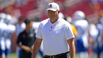Sep 4, 2021; Los Angeles, California, USA;  USC TUSC Trojans head coach Clay Helton walks on the field before the game against the San Jose State Spartans at United Airlines Field at Los Angeles Memorial Coliseum. Mandatory Credit: Jayne Kamin-Oncea-Imagn Images