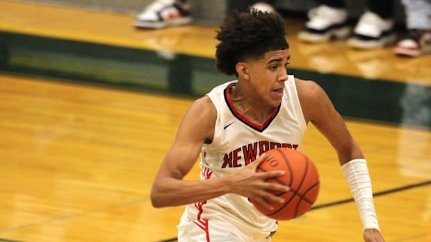 Newport sophomore Taylen Kinney races to the basket