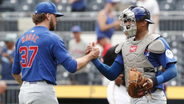 Aug 28, 2024; Pittsburgh, Pennsylvania, USA;  Chicago Cubs relief pitcher Porter Hodge (37) and catcher Christian Bethancourt (60) celebrate after defeating the Pittsburgh Pirates at PNC Park.  Chicago won 14-10. 