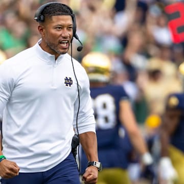 Notre Dame coach Marcus Freeman celebrates a turnover by the defense agains Purdue during the first half at Notre Dame Stadium.