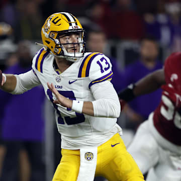 Nov 4, 2023; Tuscaloosa, Alabama, USA; LSU Tigers quarterback Garrett Nussmeier (13) throws  pass against the Alabama Crimson Tide during the second half at Bryant-Denny Stadium. Mandatory Credit: Butch Dill-Imagn Images