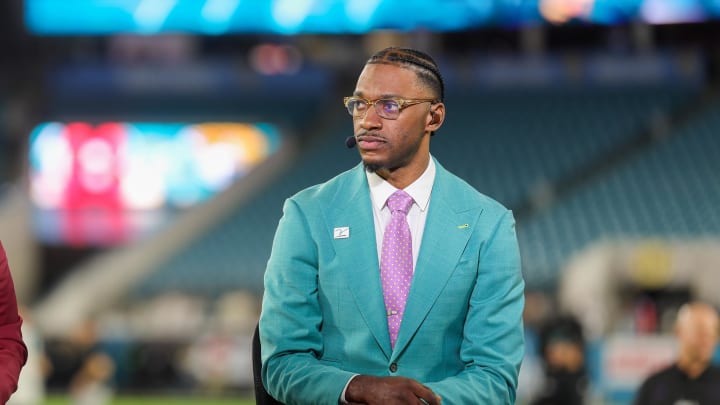 Dec 4, 2023; Jacksonville, Florida, USA;  ESPN Marcus Spears (right center) and Robert Griffin III (right) broadcast before a game between the Cincinnati Bengals and Jacksonville Jaguars at EverBank Stadium. Mandatory Credit: Nathan Ray Seebeck-USA TODAY Sports