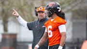 Oregon State offensive coordinator Ryan Gunderson talks with his quarterback Maalik Murphy (6) during the first day of spring practice at the Tommy Prothro Football Complex on Tuesday, March 4, 2025, in Corvallis, Ore.