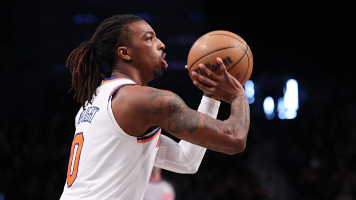 Apr 13, 2025; Brooklyn, New York, USA;  New York Knicks guard Delon Wright (0) shoots the ball during the first half against the Brooklyn Nets at Barclays Center. Mandatory Credit: Vincent Carchietta-Imagn Images