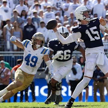 Oct 5, 2024; University Park, Pennsylvania, USA; Penn State Nittany Lions quarterback Drew Allar (15) throws a pass during the fourth quarter against the UCLA Bruins at Beaver Stadium. Mandatory Credit: Matthew O'Haren-Imagn Images