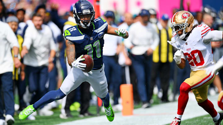 Sep 7, 2025; Seattle, Washington, USA; Seattle Seahawks wide receiver Jaxon Smith-Njigba (11) runs the ball during the first half against San Francisco 49ers at Lumen Field. Sep 7, 2025; Seattle, Washington, USA; Seattle Seahawks wide receiver Jaxon Smith-Njigba (11) runs the ball during the first half against San Francisco 49ers at Lumen Field.