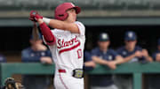 Feb 28, 2025; Stanford, CA, USA; Stanford Cardinal center fielder Charlie Bates (10) bats against the Xavier Musketeers during the second inning at Sunken Diamond. Mandatory Credit: Darren Yamashita-Imagn Images