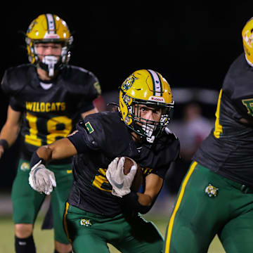 Forest Wildcats Jayden Serrano (25) looks for a hole in the first half. The Forest Wildcats hosted the Vanguard Knights at Forest High School in Ocala, FL on Friday, November 1, 2024. [Doug Engle/Ocala Star Banner]