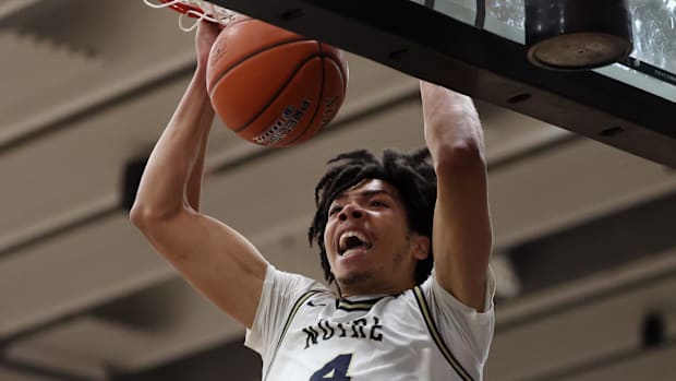Notre Dame High School (CA) forward Tyran Stokes (4) celebrates a slam dunk against Sandra Day O'Connor (AZ)