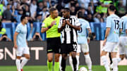 Pierre Kalulu of Juventus FC talks with referee Davide Massa...