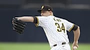 Sep 27, 2025; San Diego, California, USA; San Diego Padres starting pitcher Michael King (34) delivers during the first inning against the Arizona Diamondbacks at Petco Park. Mandatory Credit: Denis Poroy-Imagn Images