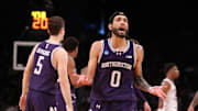 March 22, 2024, Brooklyn, NY, USA; Northwestern Wildcats guard Boo Buie (0) reacts against the Florida Atlantic Owls  in the first round of the 2024 NCAA Tournament at the Barclays Center. Mandatory Credit: Brad Penner-Imagn Images