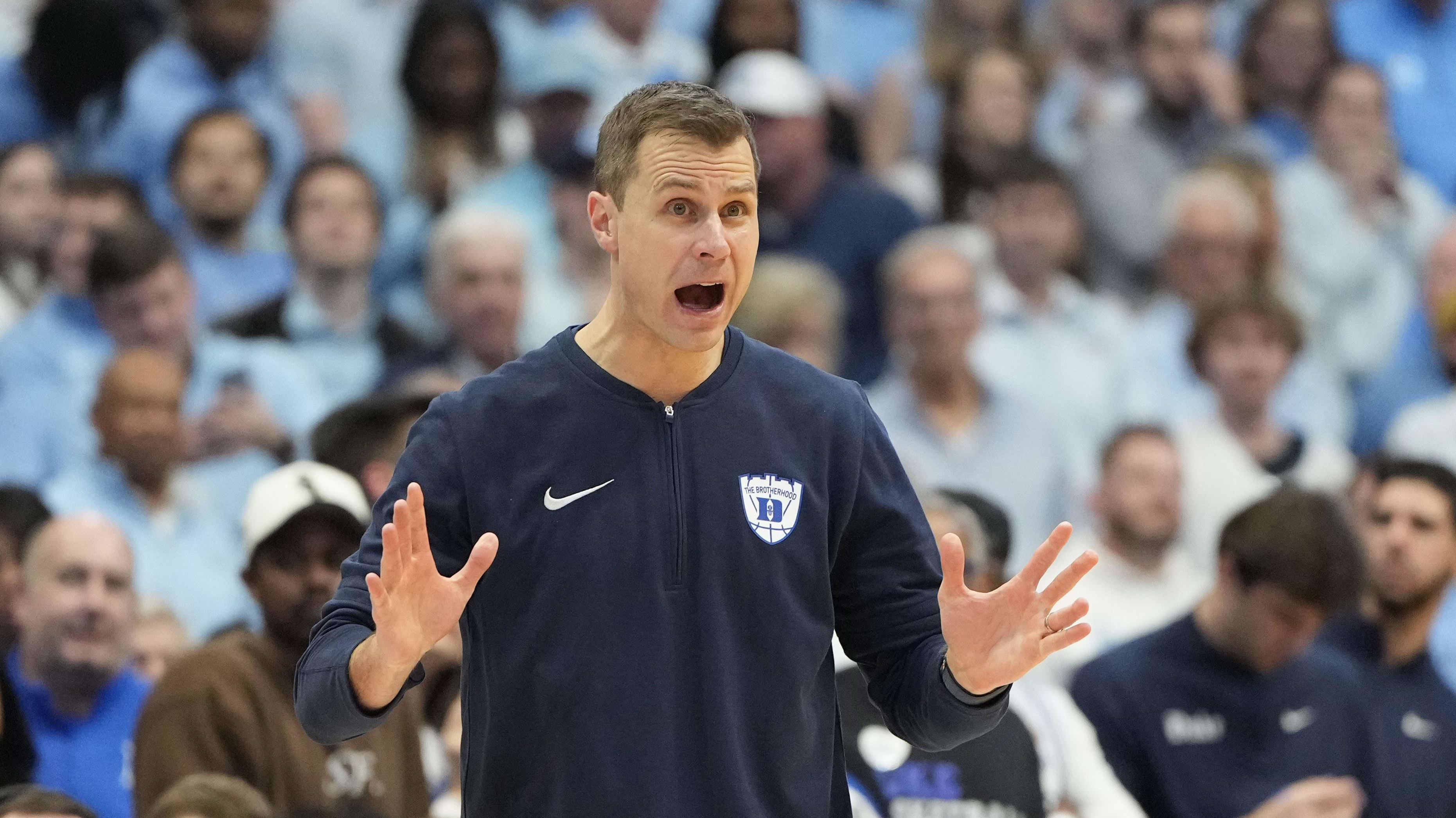 Duke basketball head coach Jon Scheyer vs. UNC