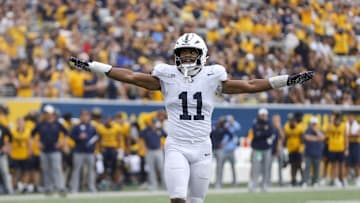 Aug 31, 2024; Morgantown, West Virginia, USA; Penn State Nittany Lions defensive end Abdul Carter (11) celebrates after a defensive stop during the fourth quarter against the West Virginia Mountaineers at Mountaineer Field at Milan Puskar Stadium. Mandatory Credit: Ben Queen-Imagn Images