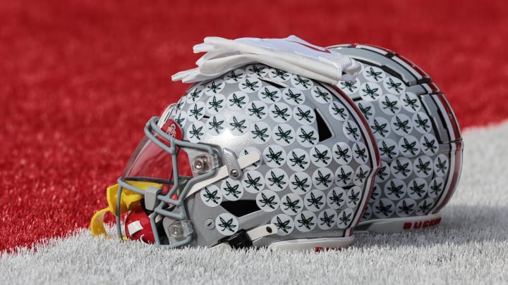 Nov 4, 2023; Piscataway, New Jersey, USA; Ohio State Buckeyes helmets rest on the field before the game against the Rutgers Scarlet Knights at SHI Stadium.